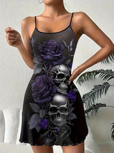Load image into Gallery viewer, A black skull and purple roses gothic slip dress on a smiling fair haired woman.