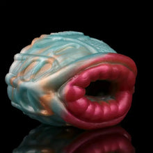 Load image into Gallery viewer, Alien mouth glands trainer for men on a black marble bench top.