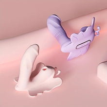 Load image into Gallery viewer, A pink and lavender butterfly shaped retractable vibrator sex toy on a pastel pink background.