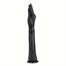 Load image into Gallery viewer, A 38cm black fisting dildo  standing upright on a white bench.