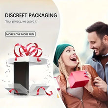 Load image into Gallery viewer, A man giving a woman a translucent dildo filled with snowflakes in a red gift box.