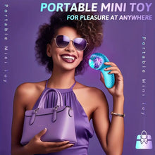 Load image into Gallery viewer, A teal mini electric pulse vibrator sex toy in the hands of a smiling woman in a purple dress.
