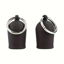 Load image into Gallery viewer, Two black silicone nipple suckers silver metal pull rings standing upright side by side.