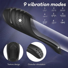 Load image into Gallery viewer, A black penis and balls massager vibrating on a blue background.