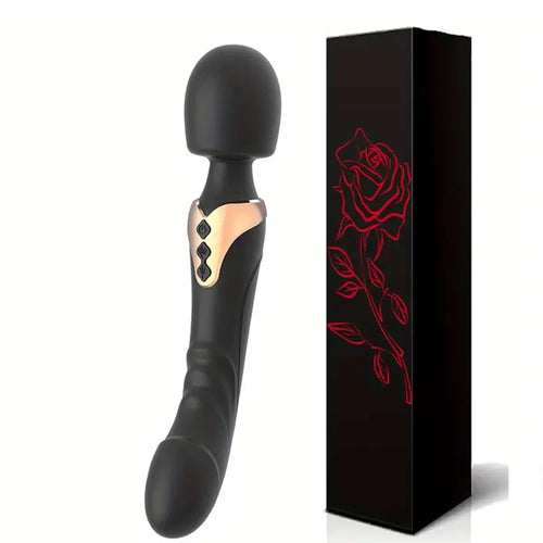 A black wonder wand vibrator standing against a black box with a red rose.
